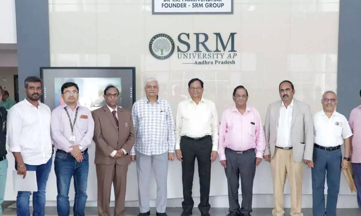 Dignitaries at a meeting held at SRM University-AP in Neerukonda on Monday
