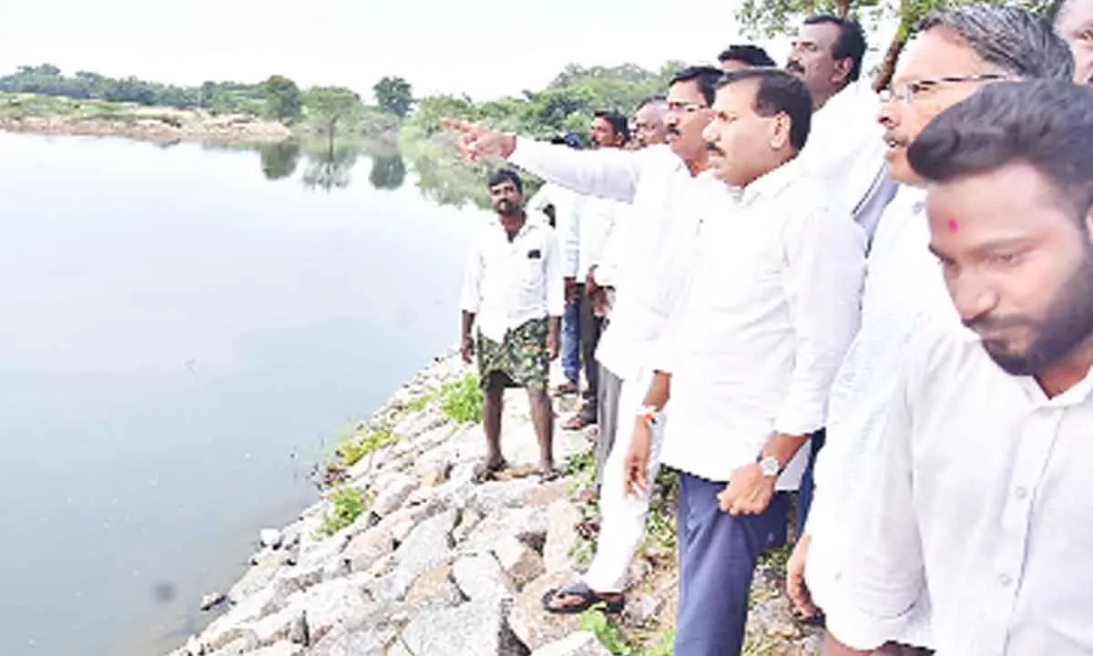 Agriculture Minister, along with Kollapur MLA ,inspecting the newly inaugurated check dam in Wanaparthy district recently