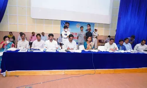 Medical and Health Minister Vidadala Rajini addressing a regional medical and health review meeting in Guntur on Tuesday. Principal Secretary, Medical and Health MT Krishna Babu is also seen.