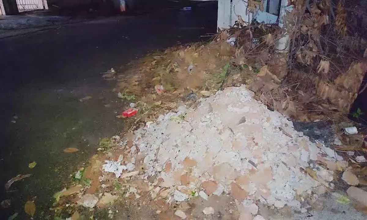 Uncleared debris dumped at MVP Colony, sector IV, for days in Visakhapatnam