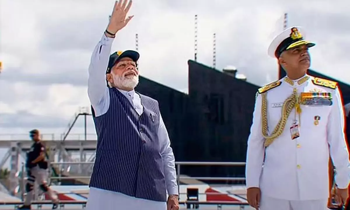 Prime Minister Narendra Modi with Chief of Naval Staff Admiral R. Hari Kumar during the commissioning ceremony of INS Vikrant (Photo | PTI)