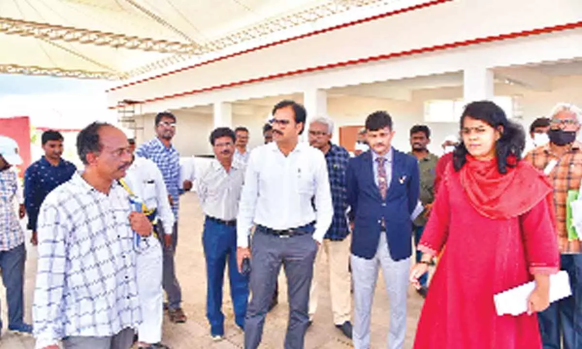 District Collector M Venugopal Reddy and GMC Commissioner Keerthi Chekuri visiting Shilparamam that is under construction in Guntur on Friday