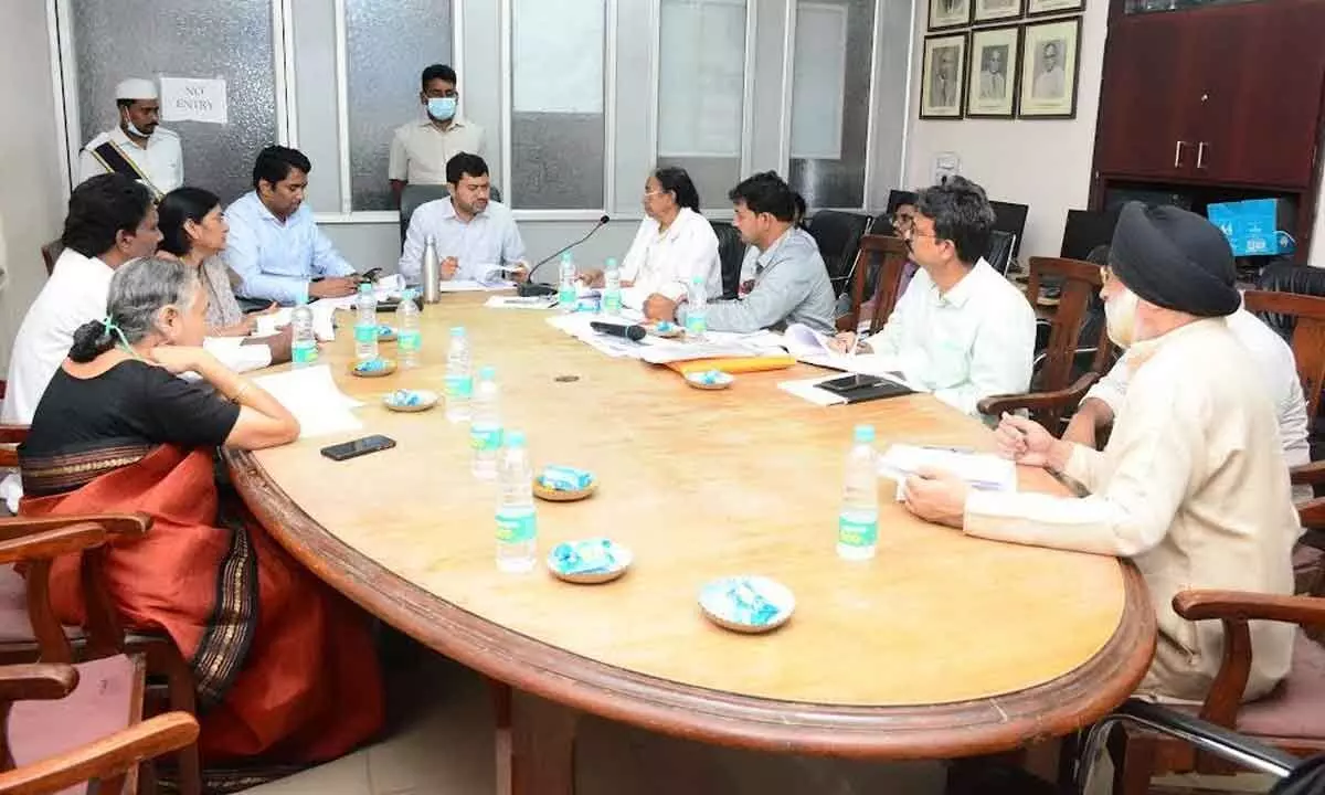 District Collector A Mallikarjuna at the review meeting held with King George Hospital personnel and other officials in Visakhapatnam on Friday