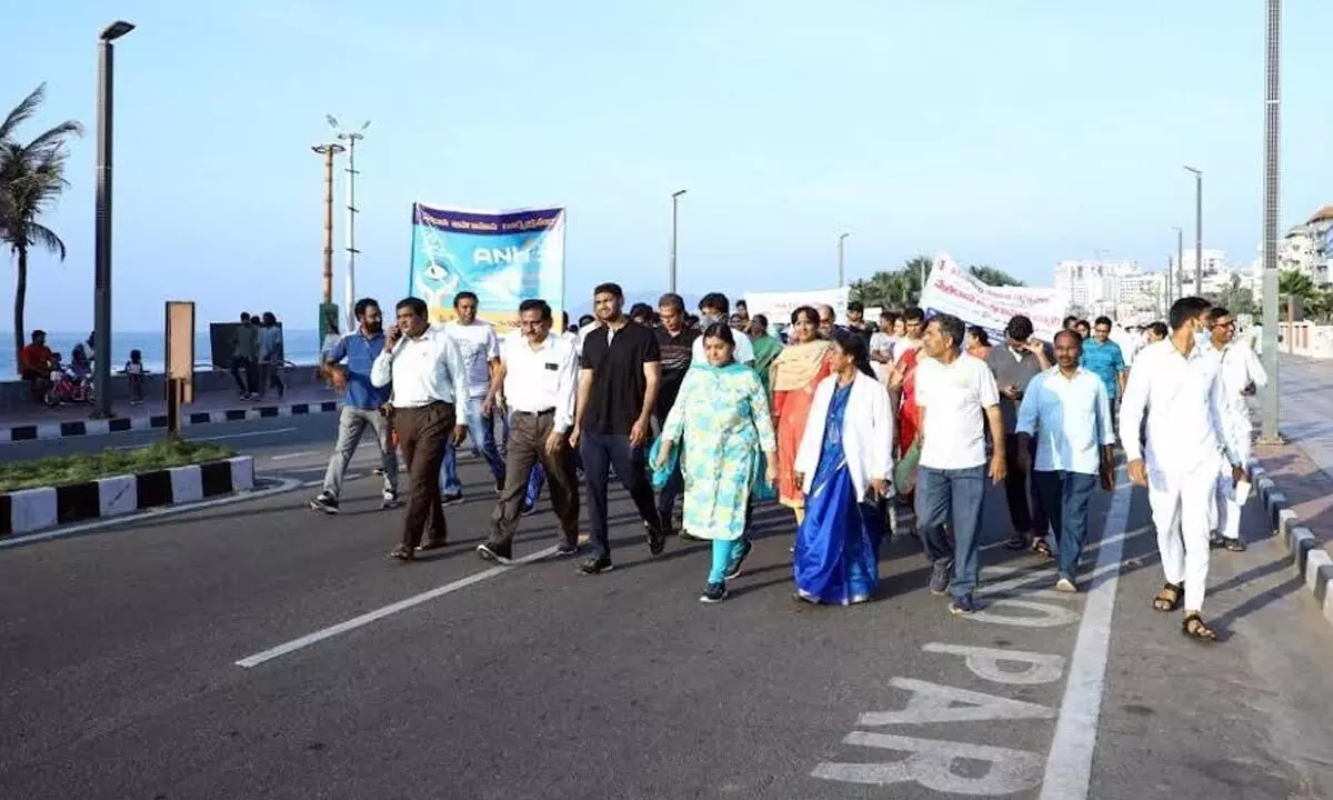 Joint Collector KS Viswanathan, among others, taking part in the rally organised as part of the 37th National Eye Donation Fortnight at Beach Road in Visakhapatnam on Sunday