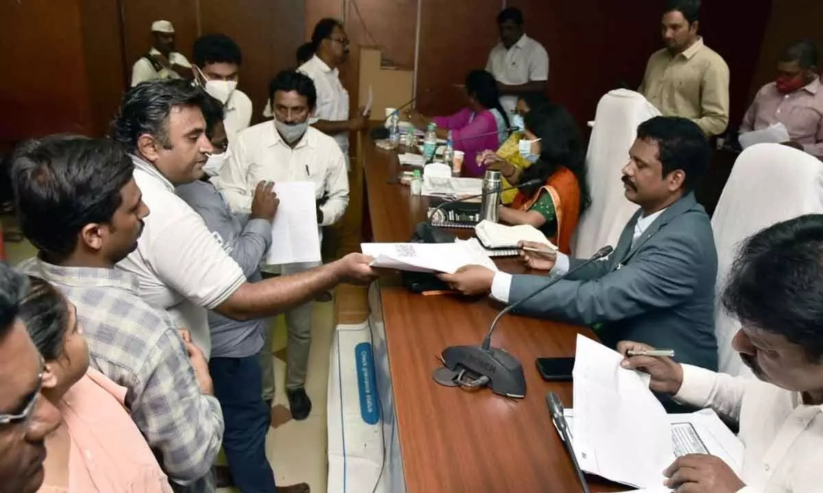 District Collector S Dilli Rao receiving petitions from people at Spandana programme in Vijayawada on Monday