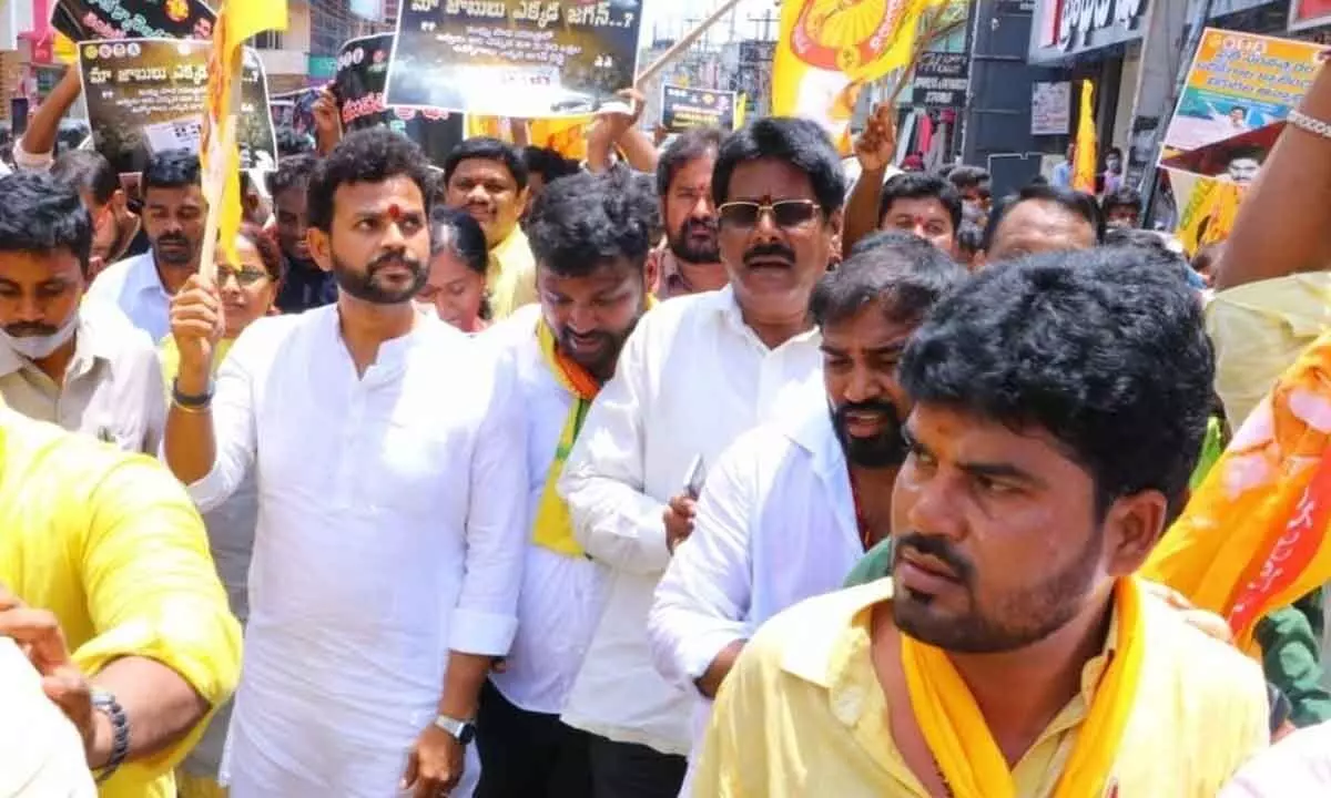 Srikakulam MP K Rammohan Naidu along with other TDP leaders take part in ‘Nirudyoga Ranam Yatra’ demanding jobs for youth in Srikakulam city on Monday