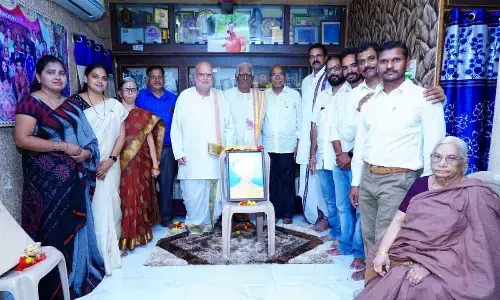 CBI former JD Lakshmi Narayana, prominent scholars Vishwanatha Gopala Krishna Sastry, Salaka Raghunatha Sharma and others at Guru puja celebration at Brown Mandiram in Rajamahendravaram on Monday