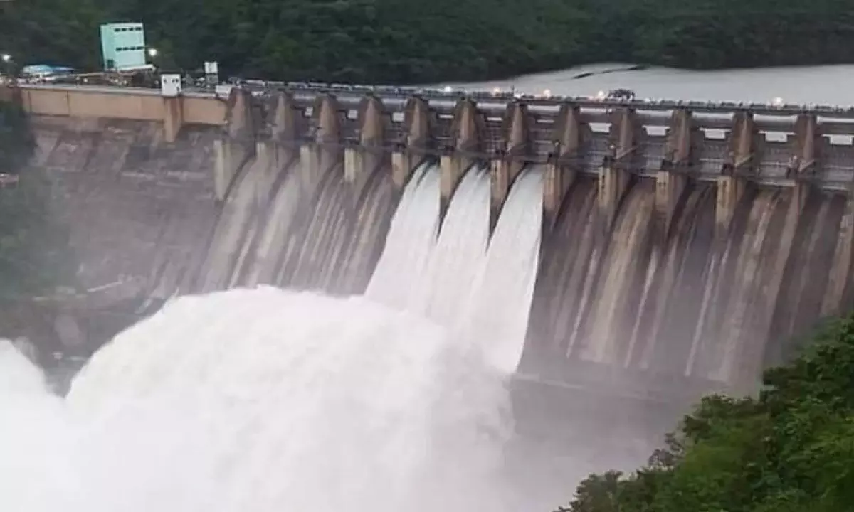 Water in Srisailam project touched 884.80 ft, three gates lifted
