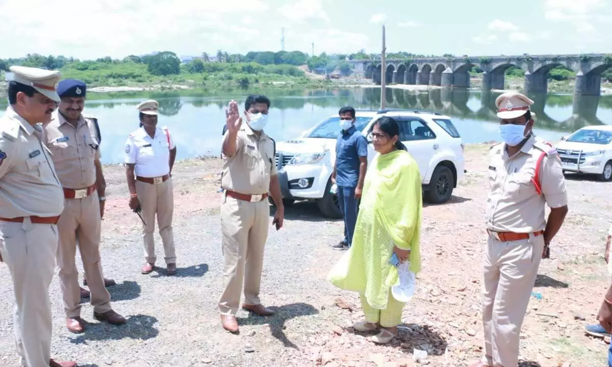 Commissioner of Police Vishnu S Warrier along with officers inspecting the arrangements for Ganesh immersion at Munneru stream in Khammam