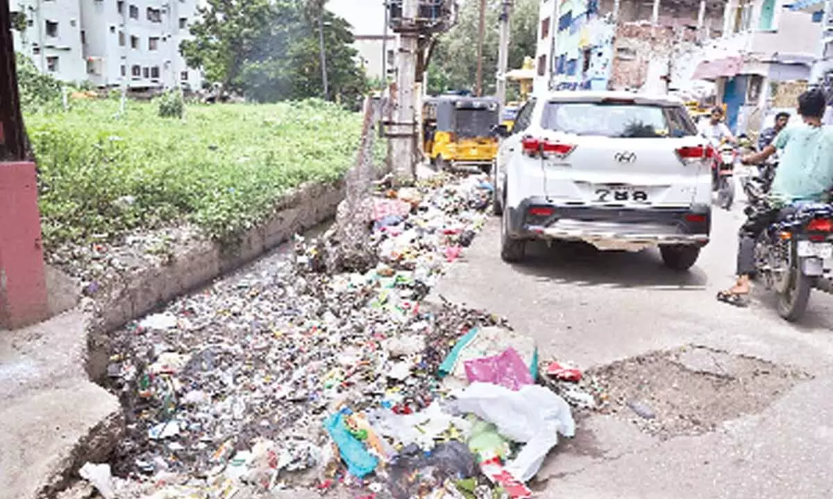 Garbage piled up at Thathaiah Gunta Gangamma temple in Tirupati on Wednesday.   Photos: Kalkata Radhakrishna