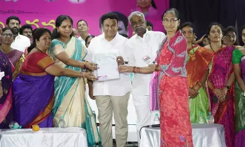 MLC Kavitha and MLA Bigala Ganesh Gupta participating in Aasara pensions distribution programme in Nizamabad on Wednesday