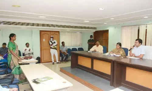 District Collector A Mallikarjuna giving instructions to a health official in Visakhapatnam on Thursday