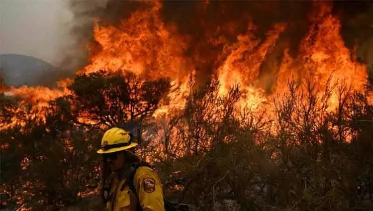 California wildfire triples in size in just 24 hours
