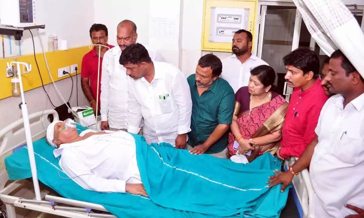 BJP leaders consoling  Erneni Rama Rao at a hospital in Khammam on Friday