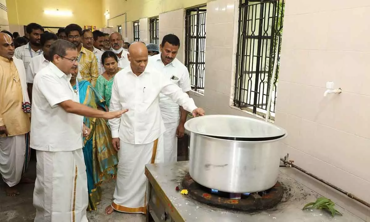 TTD Executive Officer A V Dharma Reddy looking at the kitchen appliances after the inauguration of newly built kitchen at SVIMS in Tirupati on Friday