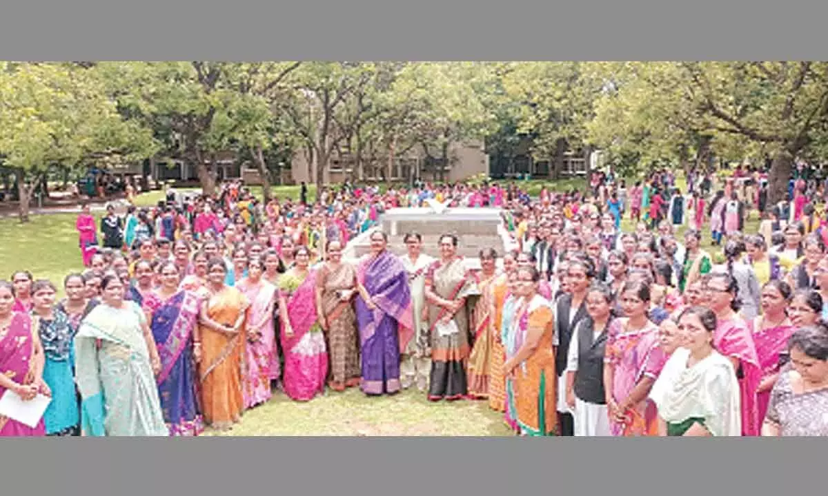 SPMVV vice-chancellor Prof D Jamuna, Prof K Anuradha, Prof Rajani and others with students at a programme on World Suicide Prevention Day, on Friday