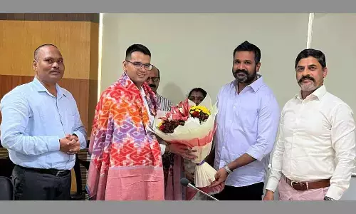 TSMDC Chairman Krishank Manne welcoming  UP government Special Secretary Vinit Jain at TSMDC office in Hyderabad on Saturday