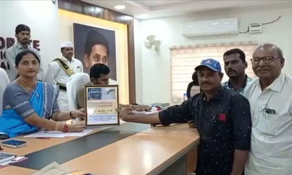 President of Alluri Sitarama Raju National Youth Association Padala Veerabhadra Rao and others submitting a petition to District Collector K Madhavi Latha at her office in Rajamahendravaram on Monday