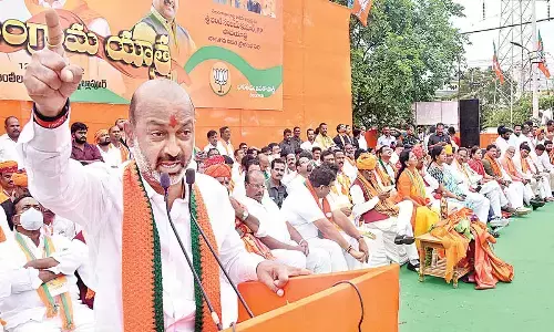 Telangana BJP president Bandi Sanjay Kumar at a public meeting in Ramlila Maidan, Quthbullapur in Hyderabad on Monday