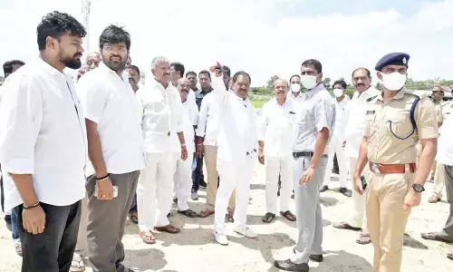 Deputy Chief Minister K Narayana Swamy and Minister Peddireddi Ramachandra Reddy inspecting helipad arrangements on Monday ahead of the Chief Minister’s visit to Kuppam