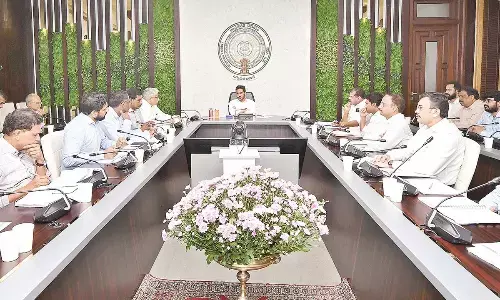 Chief Minister Y S Jagan Mohan Reddy holding a review on school education at his camp office in Tadepalli on Monday
