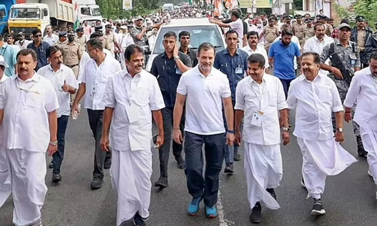 Congress leader Rahul Gandhi with party leaders and workers during the Bharat Jodo Yatra, in Thiruvananthapuram district. (Photo | PTI)