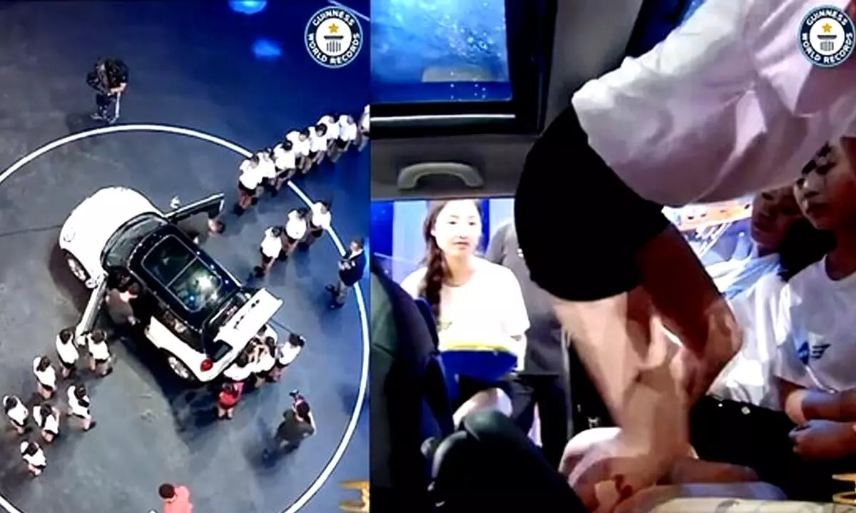 29 Individuals Fit In A Five-Seater Mini Cooper For Guinness World Record