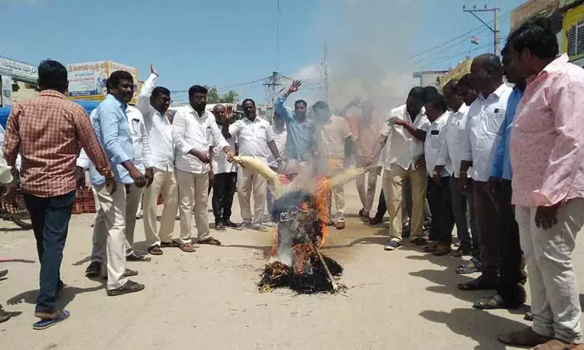 Dalit organisation leaders burn effigy of MLA Raghunandan Rao in Dubbaka