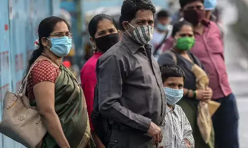 Experts make a case for continued mask use