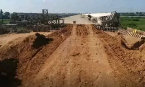 File photo of Naguladinne bridge works going on River Tungabhadra.