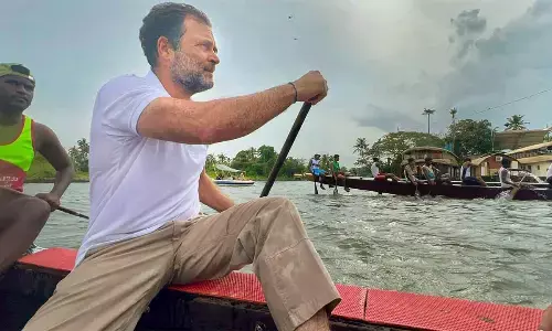 Congress leader Rahul Gandhi participates in a snake boat race exhibition in Punnamada Lake of Kerala, on Monday