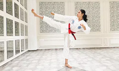Taekwondo coach Kavya Krishna bags 2 gold medals at national championship