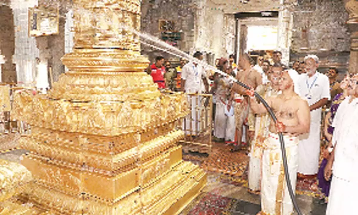 TTD EO A V Dharma Reddy takes part in cleaning in Tirumala temple as part of  Koil Alwar Tirumanjanam on Tuesday