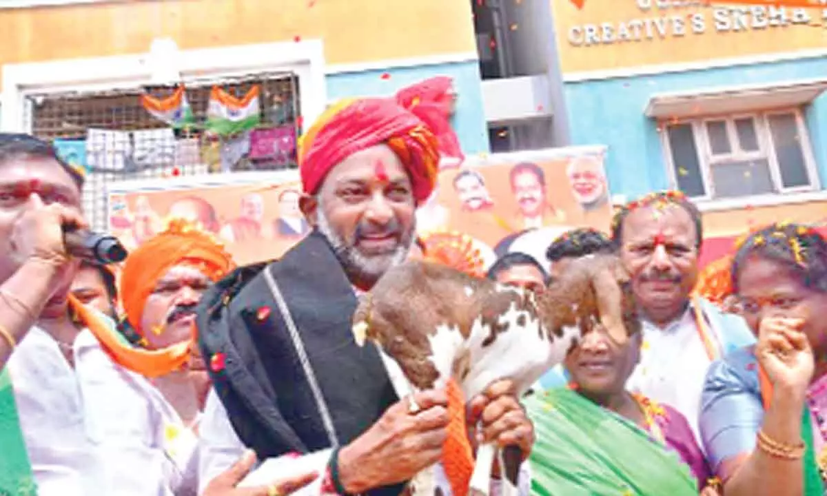 BJP chief Bandi Sanjay Kumar at Nagole crossroads during his Praja Sangrama Yatra on Wednesday