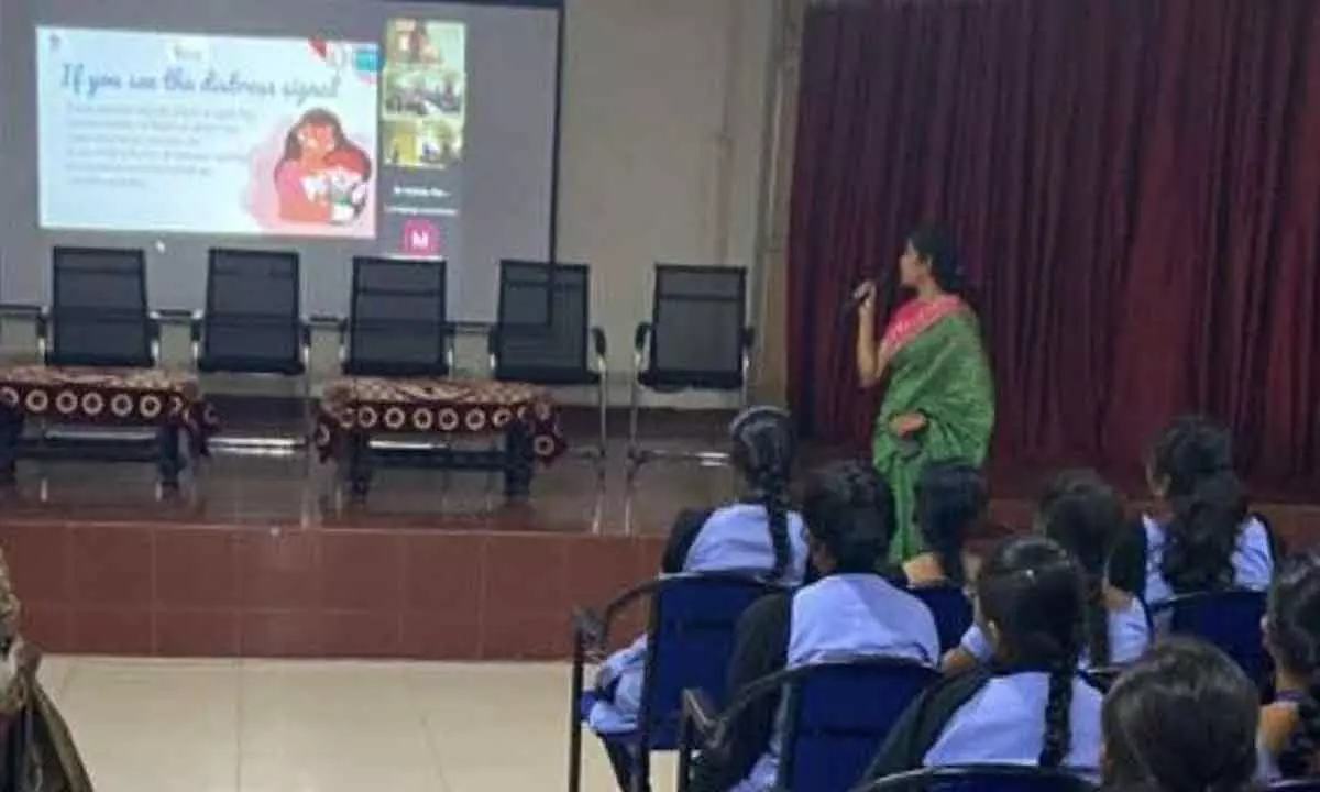 Dr Sailaja Nalluri addressing a seminar on ‘Dheera-violence against women’ at Andhra Loyola College in Vijayawada on Wednesday