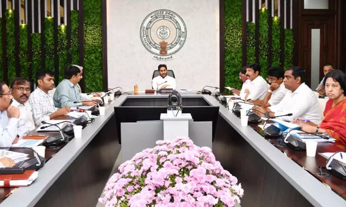 Chief Minister Y S Jagan Mohan Reddy reviews progress in housing works at his camp office in Tadepalli on Thursday