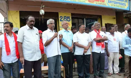 CPM State secretary V Srinivasa Rao and State executive member Ch Babu Rao speaking at Rakshana Bheri programme in Vijayawada on Thursday
