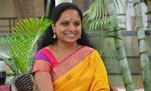 Kavitha unveils Jagruthis global Bathukamma posters