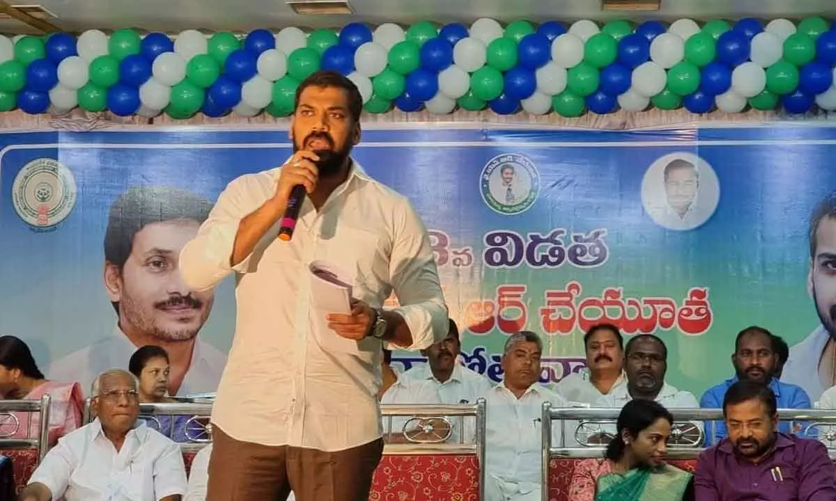 MLA Dr P Anil Kumar Yadav addressing the gathering at a programme in Nellore on Monday