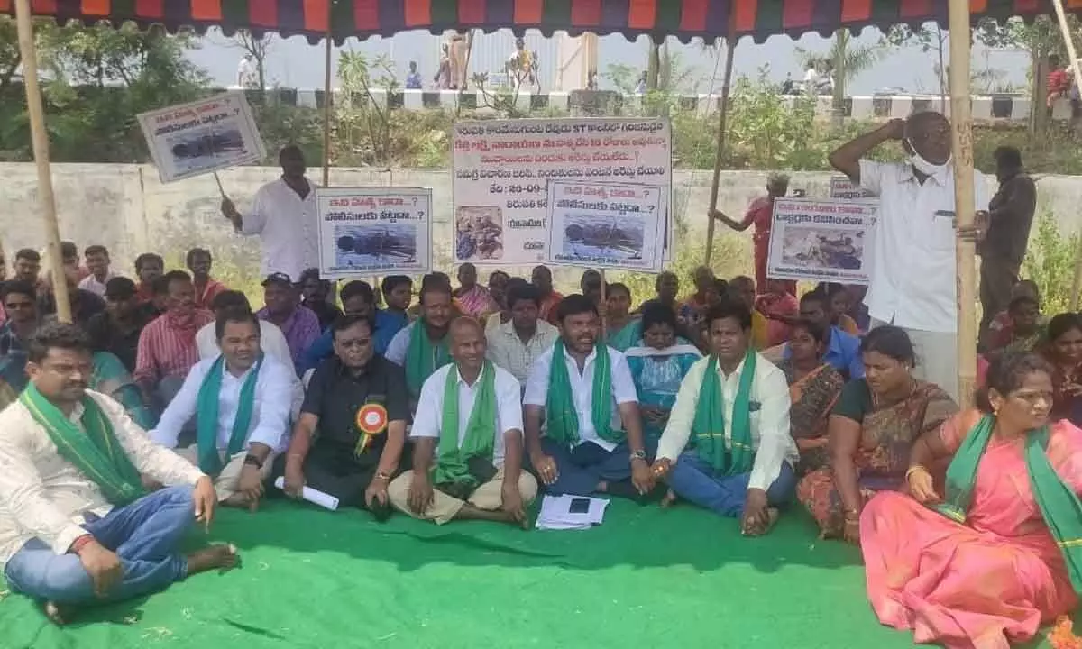 Member of Yanadis Joint Action committee staging dharna demanding the arrest of culprits involved in the murder of a tribal Lakhmi Narayana, at the Collectorate in Tirupati on Monday