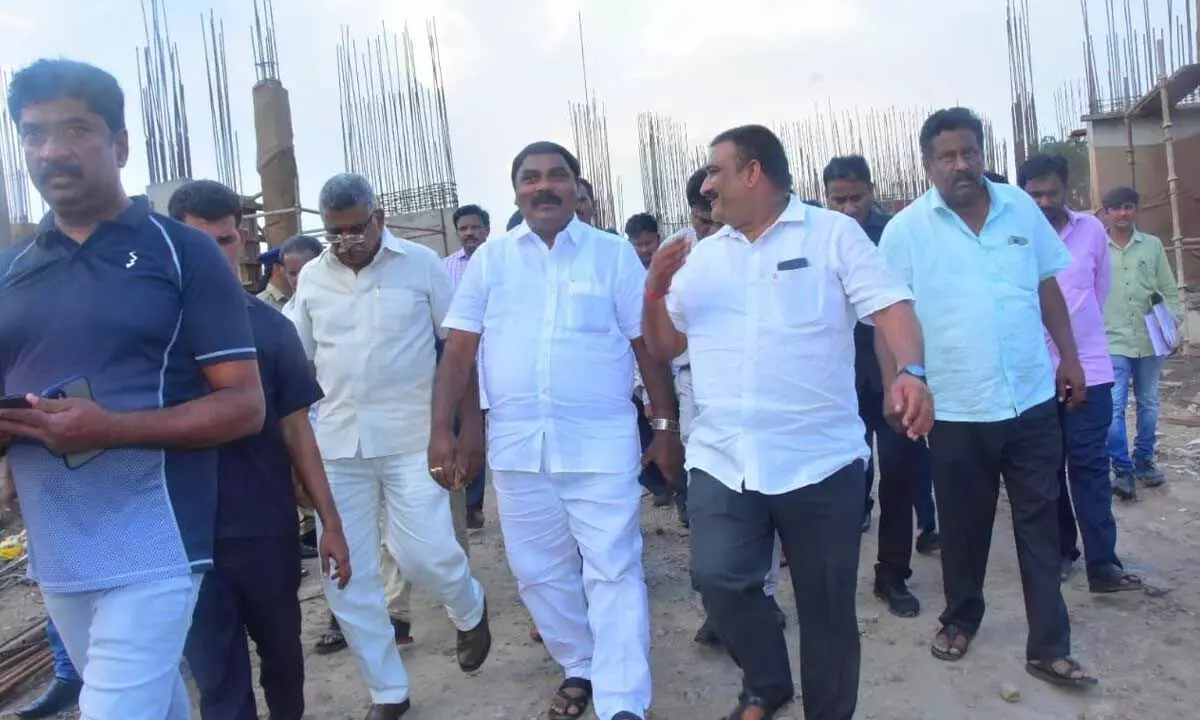 Social Welfare Minister and Ambedkar Statue Committee Chairman Merugu Nagarjuna inspecting the progress of works of Ambedkar memorial at Swaraj Maidan in Vijayawada on Tuesday