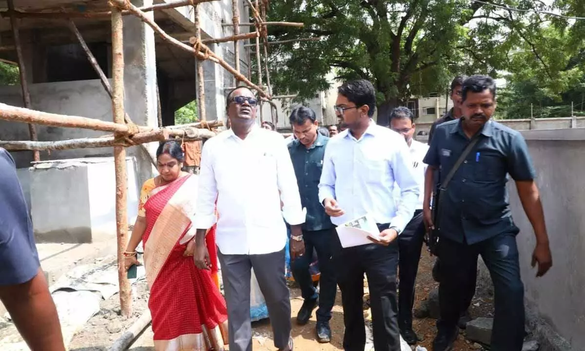 Minister for Transport Puvvada Ajay Kumar inspecting construction works of Model meat and vegetable market in Khammam town on Wednesday