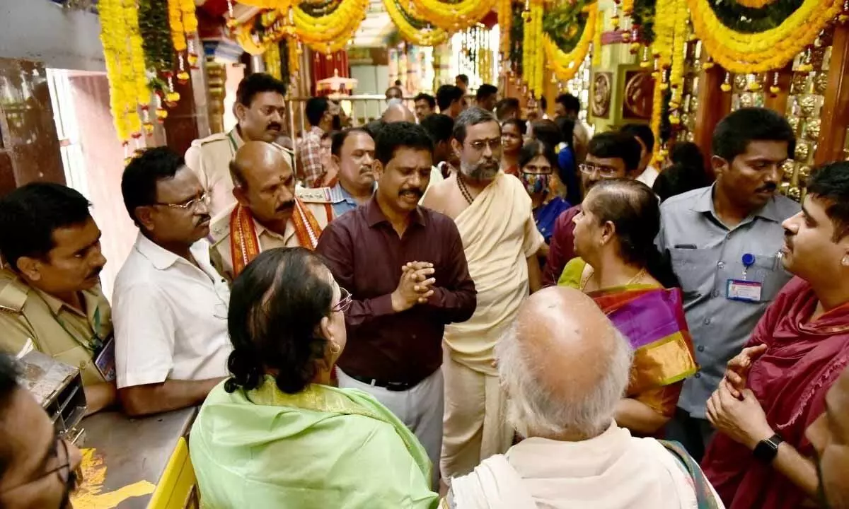 District Collector S Dilli Rao speaking to the priests of Sri Durga temple in Vijayawada on Wednesday