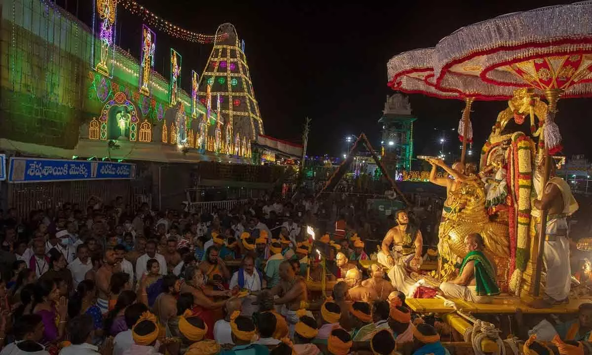 Lord Malayappa Swamy being taken out in a procession on Hamsa Vahanam at Tirumala on Wednesday evening