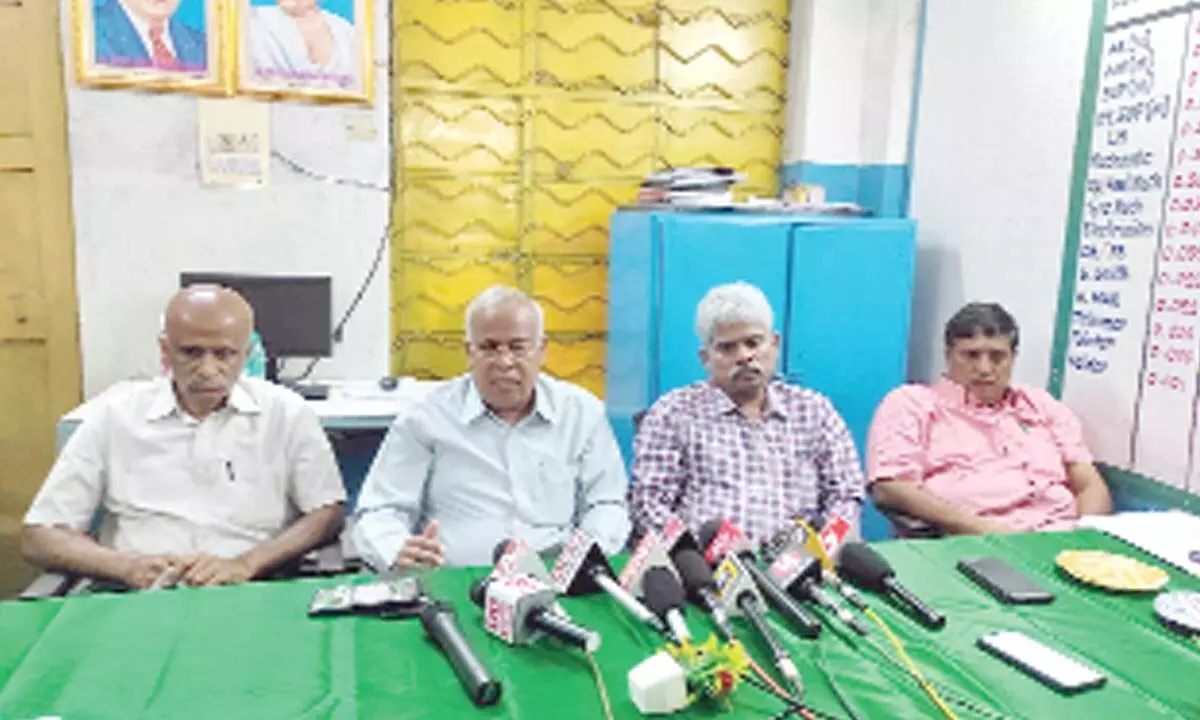 APSRTC Executive Directors Krishna Mohan, Gopinath Reddy and Ravi Varma speaking to the media in Tirupati on Wednesday