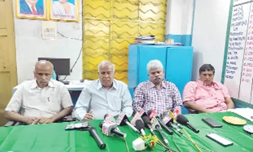 APSRTC Executive Directors Krishna Mohan, Gopinath Reddy and Ravi Varma speaking to the media in Tirupati on Wednesday