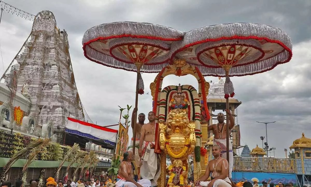 Lord Malayappa in the form of Yoganarasimha is taken in a procession atop Simha vahanam on the third day of Brahmotsavams in Tirumala on Thursday