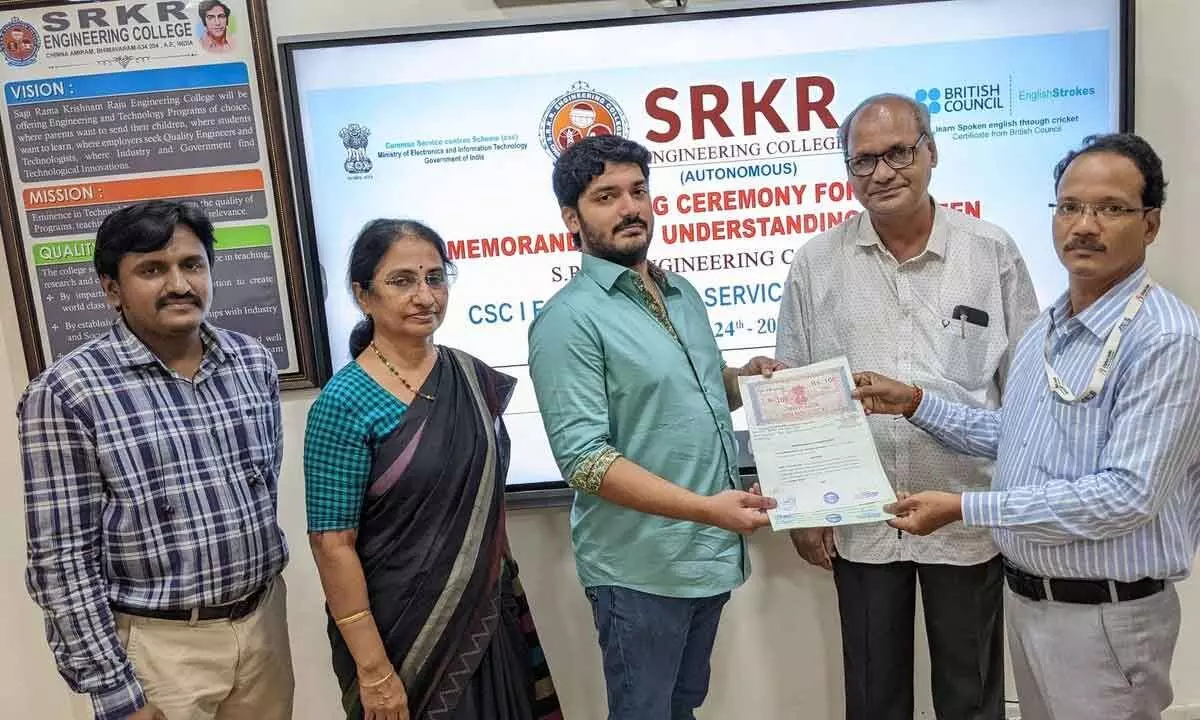 SRKR Engineering College secretary and correspondent SRK Nishant Varma and Common Service Centre representative Gautam Das exchanging the documents of MoU on the college premises in Bhimavaram on Thursday