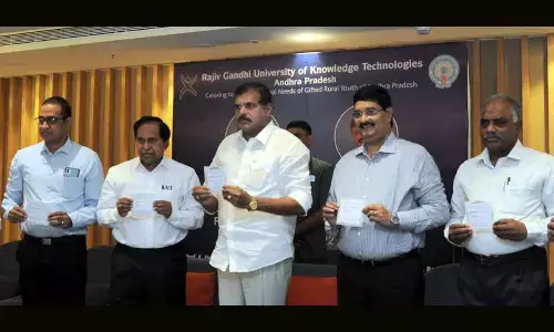 Minister for Education, Botsa Satyanarayana.and officials Releasing a UG administration s 2022.23 provisionally selected list  ( Rajiv Gandhi University) in Vijayawada on Thursday 	 Hans photo Ch Venkata Mastan )