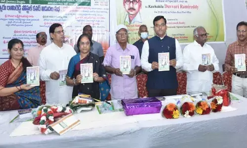 ZP Chairperson Arunamma and District Collector K V N Chakradhar Babu releasing a postal cover on Telugu poet Kavikokila Duvvuri Ramireddy and social worker Ponaka Kanakamma, in Nellore on Thursday